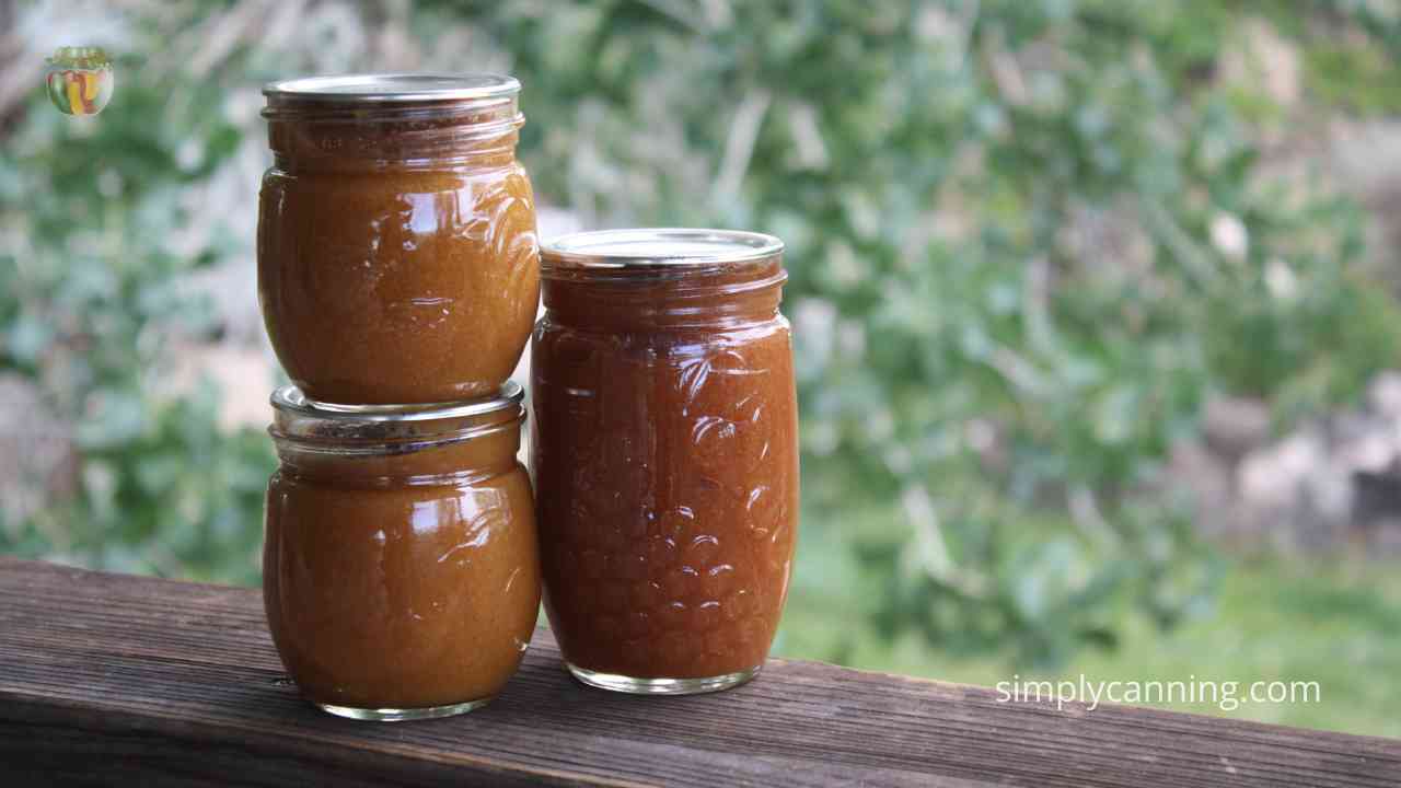 Three jars of orange fruit butter